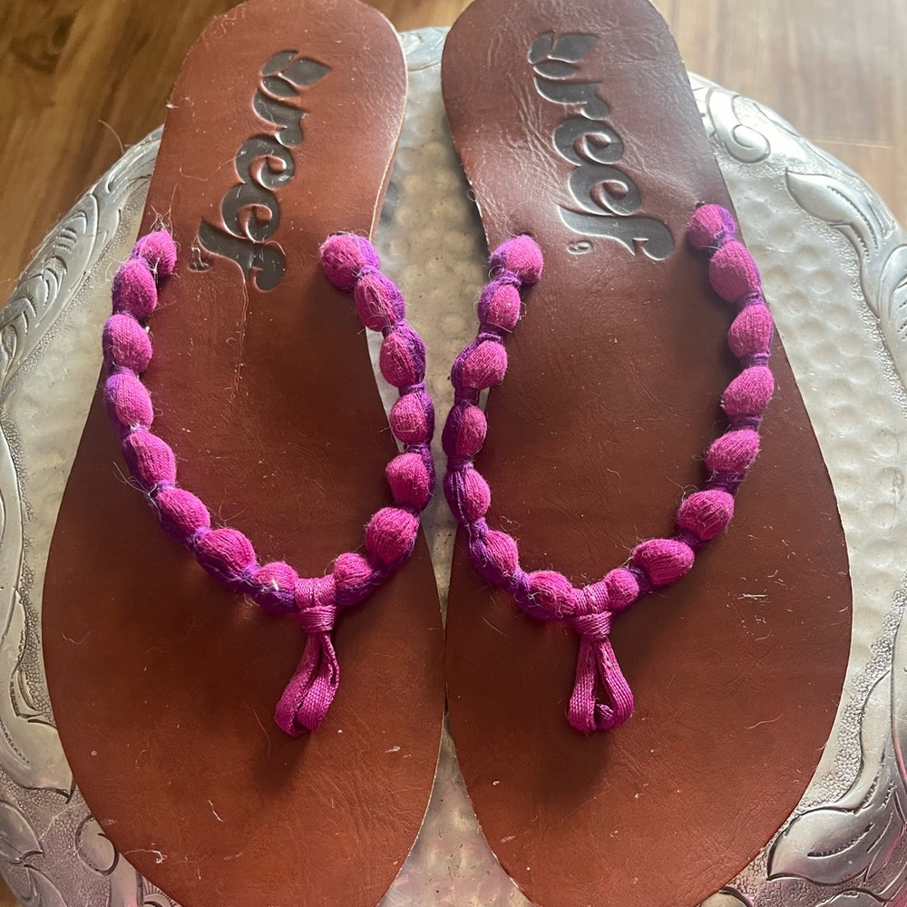 Brand New Reef Pink leather flip flops.